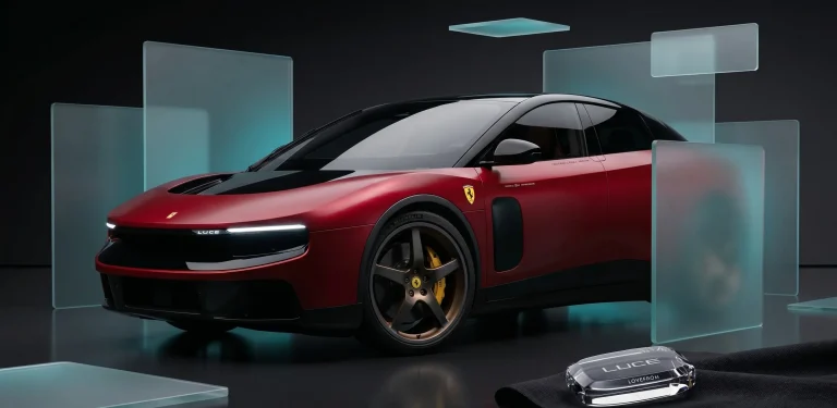 Minimalist interior dashboard and steering wheel of the Ferrari Luce electric vehicle with glassmorphic elements