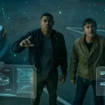 Hal Jordan and John Stewart investigate a crime scene on a dark parking lot